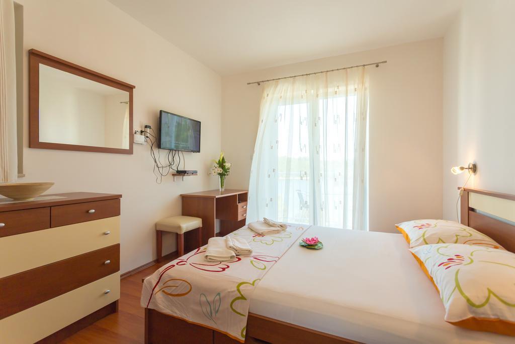 Apartments Slavica Pomena Pokoj fotografie